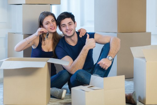 Careful loading of sofas and tables for a move in Hounslow