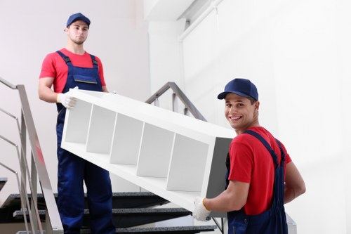 Careful furniture moving in a Hounslow residential street