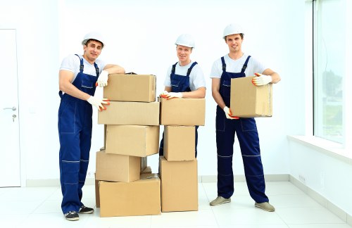 Experienced movers managing furniture loading in Hounslow