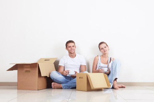 Furniture and boxes ready for a flat removals service
