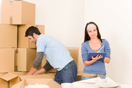 Moving team handling student furniture near Hounslow residential streets
