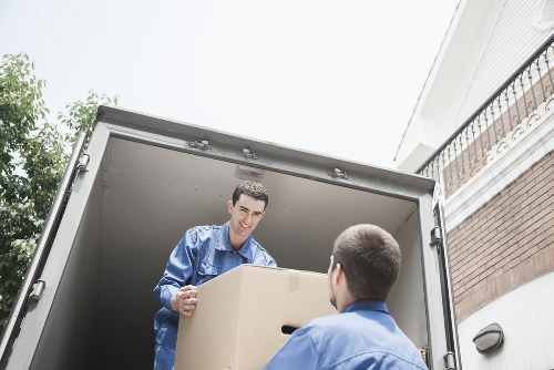 Local packing team organising belongings during a move